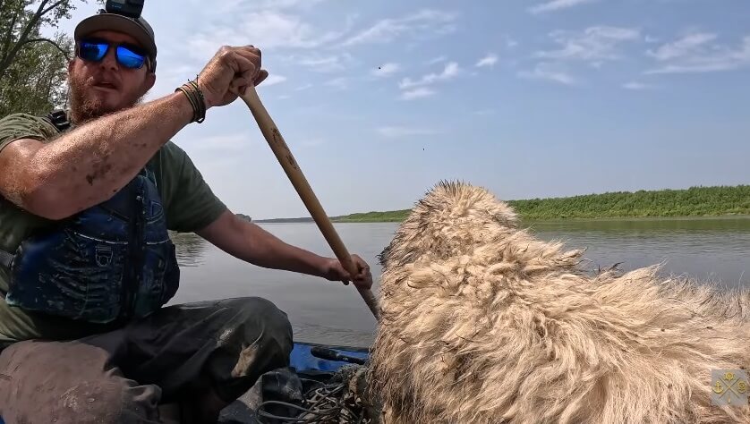 Tom carried her on his Canoe